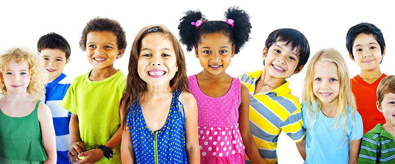 A group of diverse children posing for a photo with bright smiles, showcasing their individuality and camaraderie.